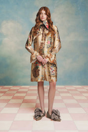 Blusa larga cuello pañuelo dorada con estampado floral de marcos inspirados en Maria Antonieta