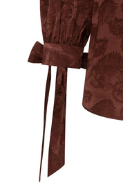 Blusa Manga Puff Mono Café - detalle manga puff y lazo