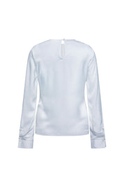 Blusa Sesgo Mancorna Cristal Ivory – vista trasera con detalle de puños y mancornas