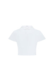 Vista trasera crop top ivory manguita cuello flor - Bettina Spitz

