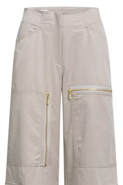 Pantalón Cremalleras Arena