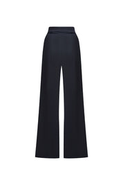 Vista trasera pantalón negro campana cortes - Bettina Spitz