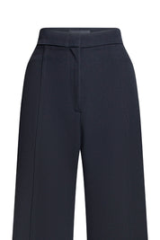 Detalle cortes pantalón campana negro - Bettina Spitz