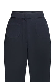 Detalle parches pantalón campana negro - Bettina Spitz