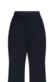 Detalle ribete pantalón campana negro - Bettina Spitz